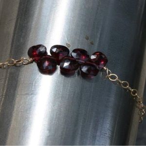 14k gold over Sterling silver garnet bracelet. Stack or wear alone. Pretty!